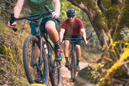 image of gravel bike riders with riser drop bars